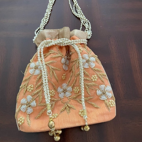 Women’s Luxuries Pearl &glass beads embellished potli bags in peach color - Picture 7 of 7